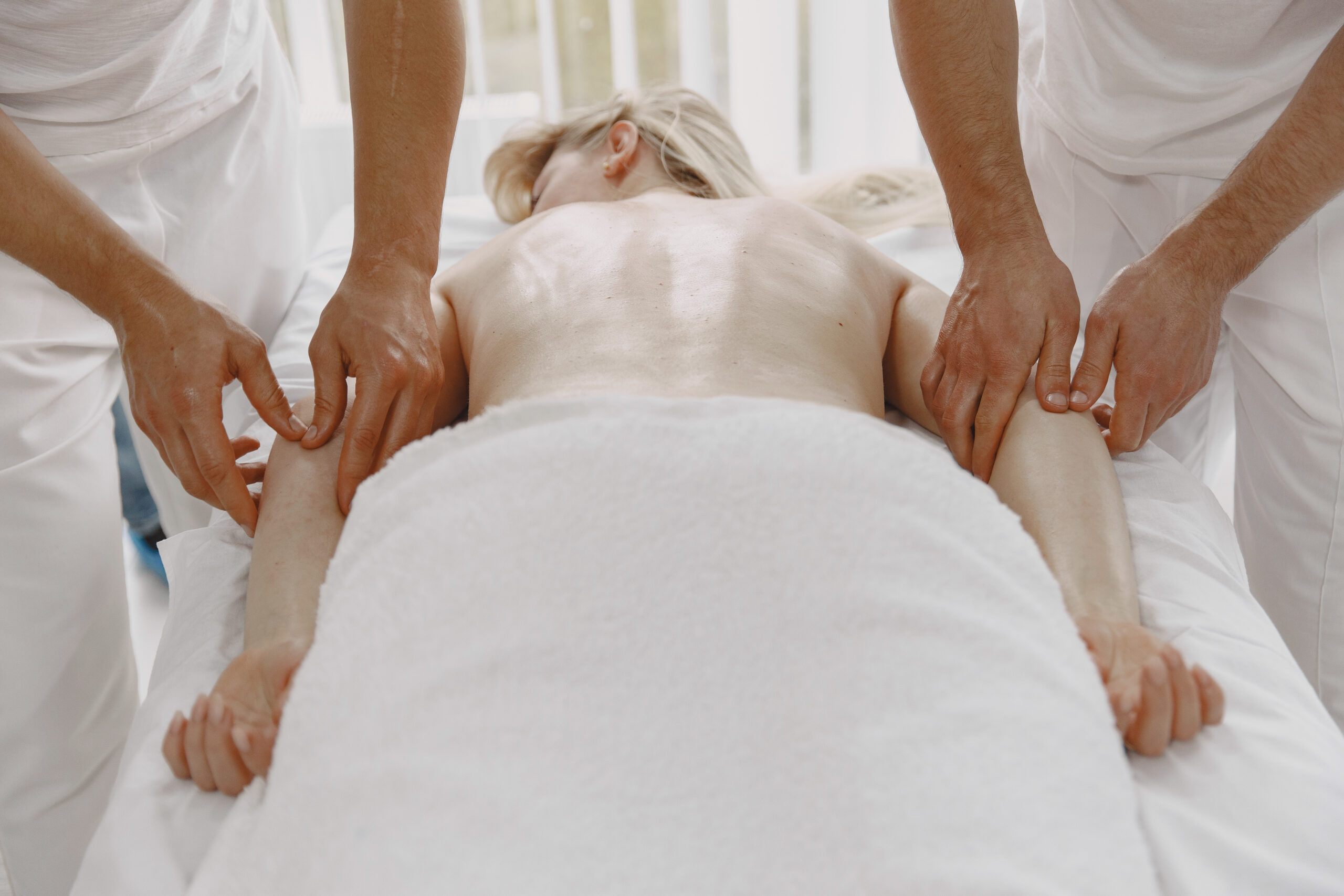 two hand massage therapy session by single therapist