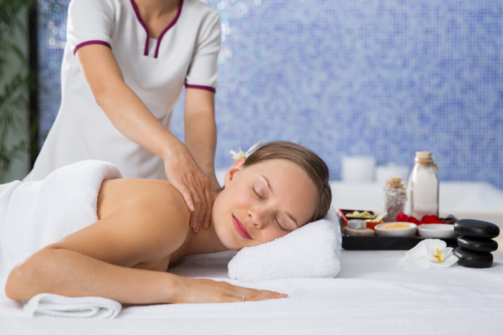 healing spa and massage therapy session by therapist